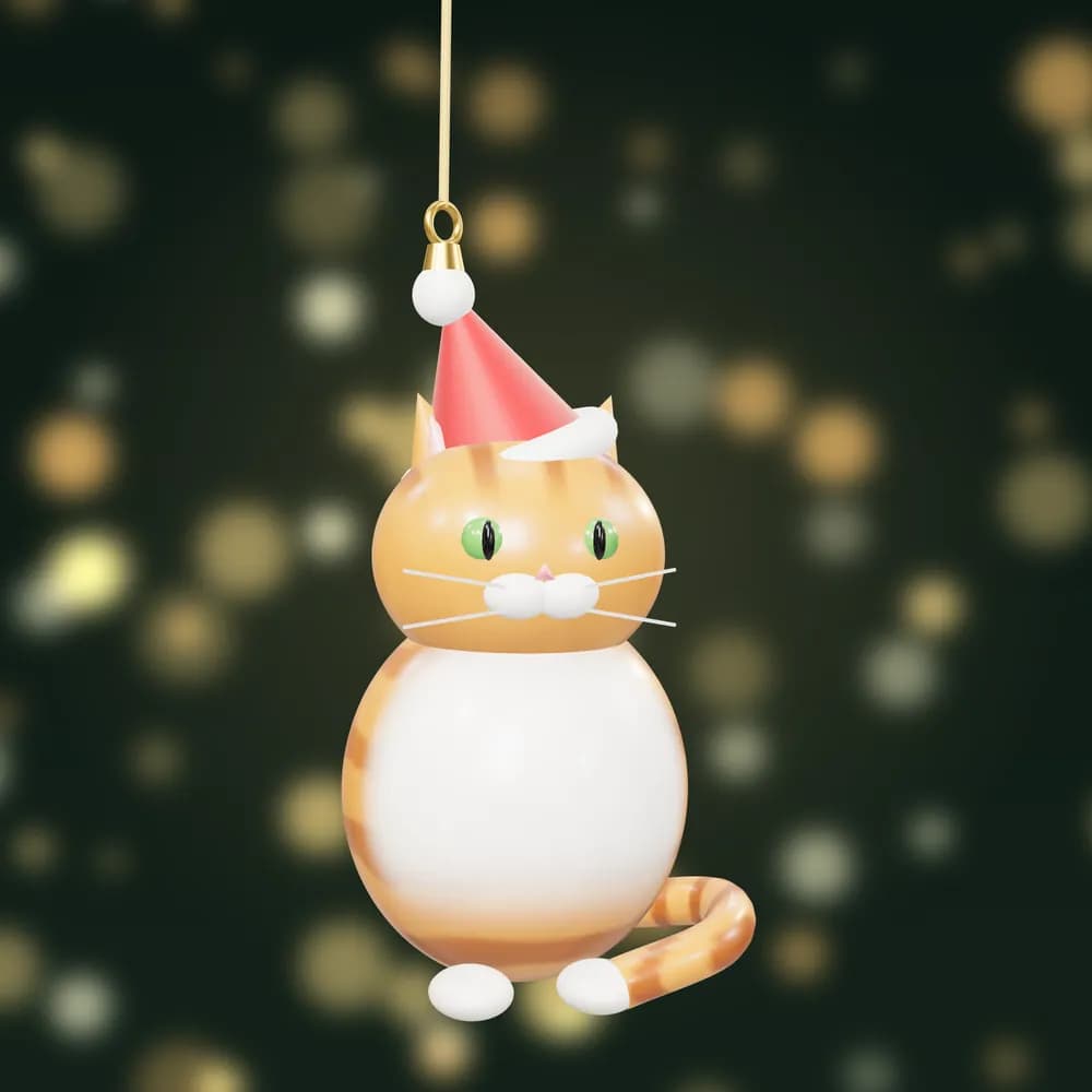 A hand-painted ginger tabby cat bauble wearing a red Santa hat, with green eyes