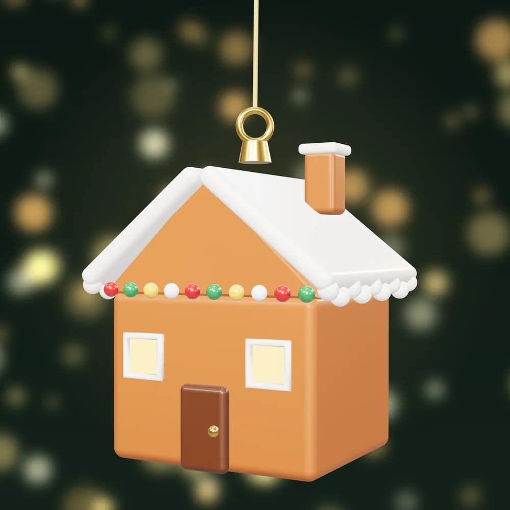 A hand-painted gingerbread house bauble with an iced roof, glowing windows and sweets along the eaves