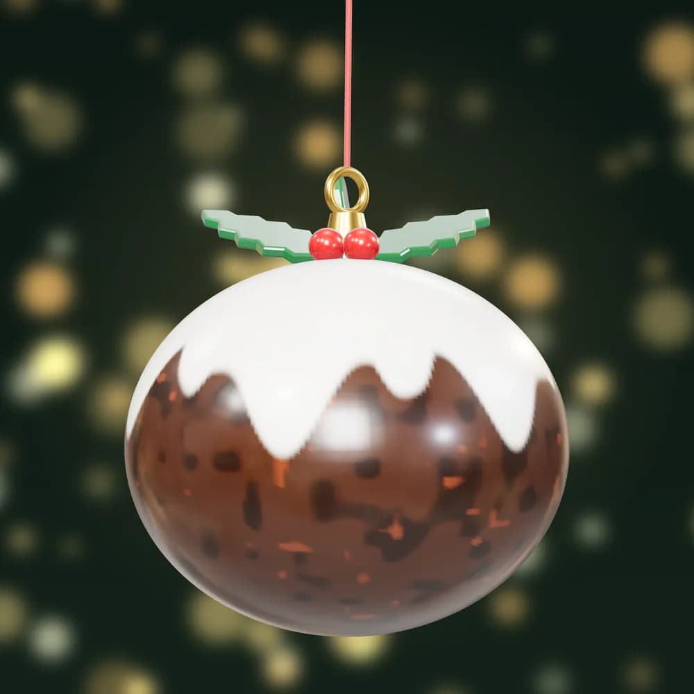 A hand-painted Christmas pudding bauble with dripping white icing, holly leaves and red berries