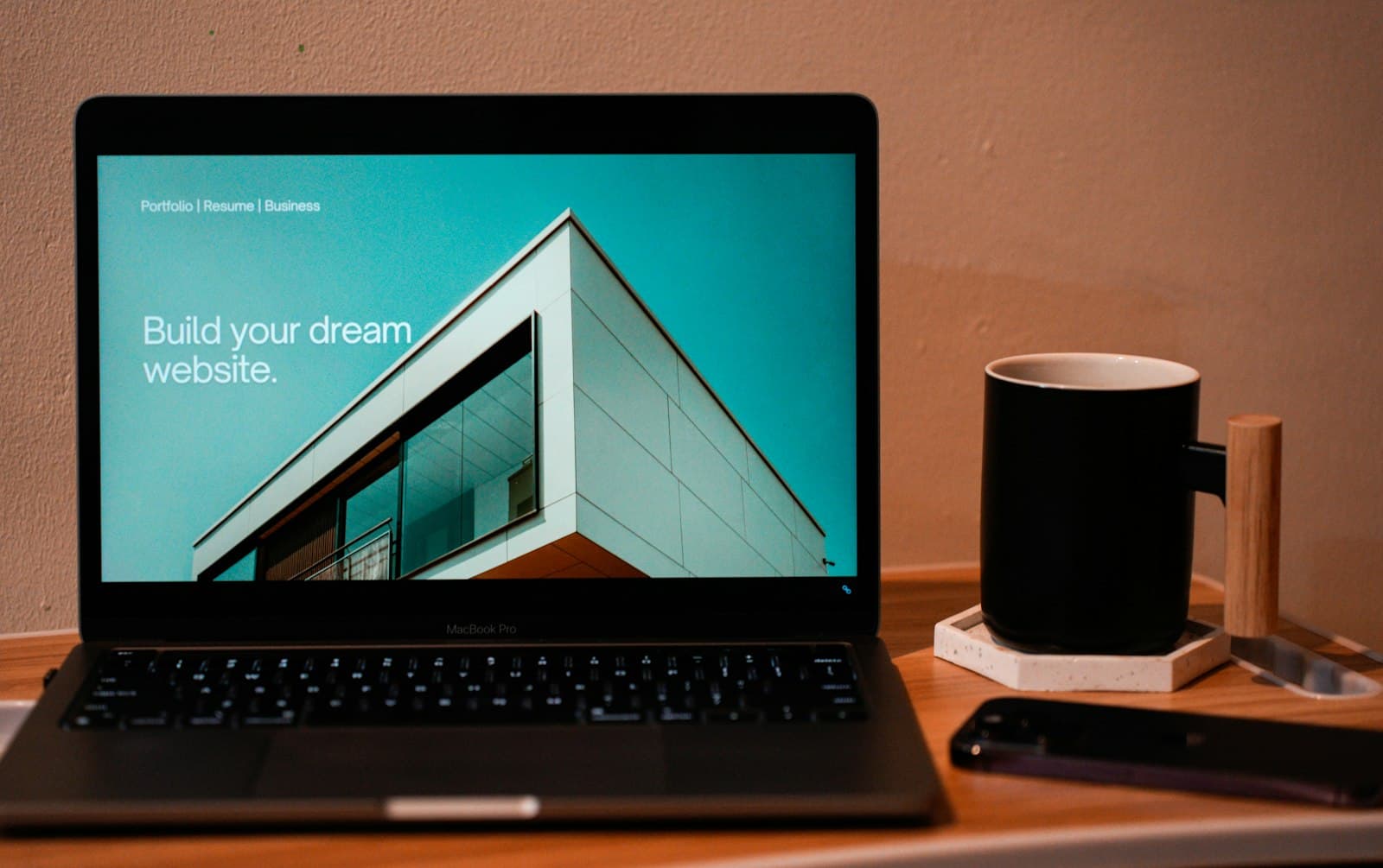 A laptop showing a simple business website