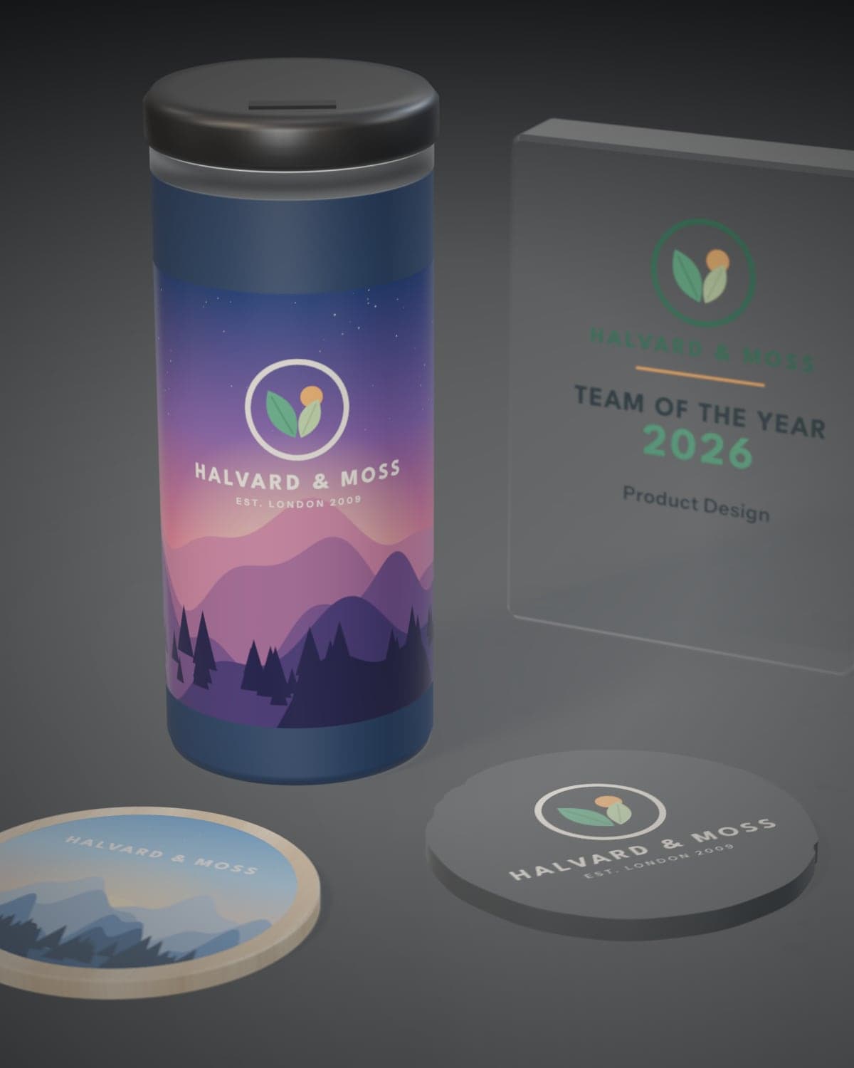 A navy tumbler printed all the way round with a full-colour dusk landscape and logo, beside a printed acrylic award and two printed coasters