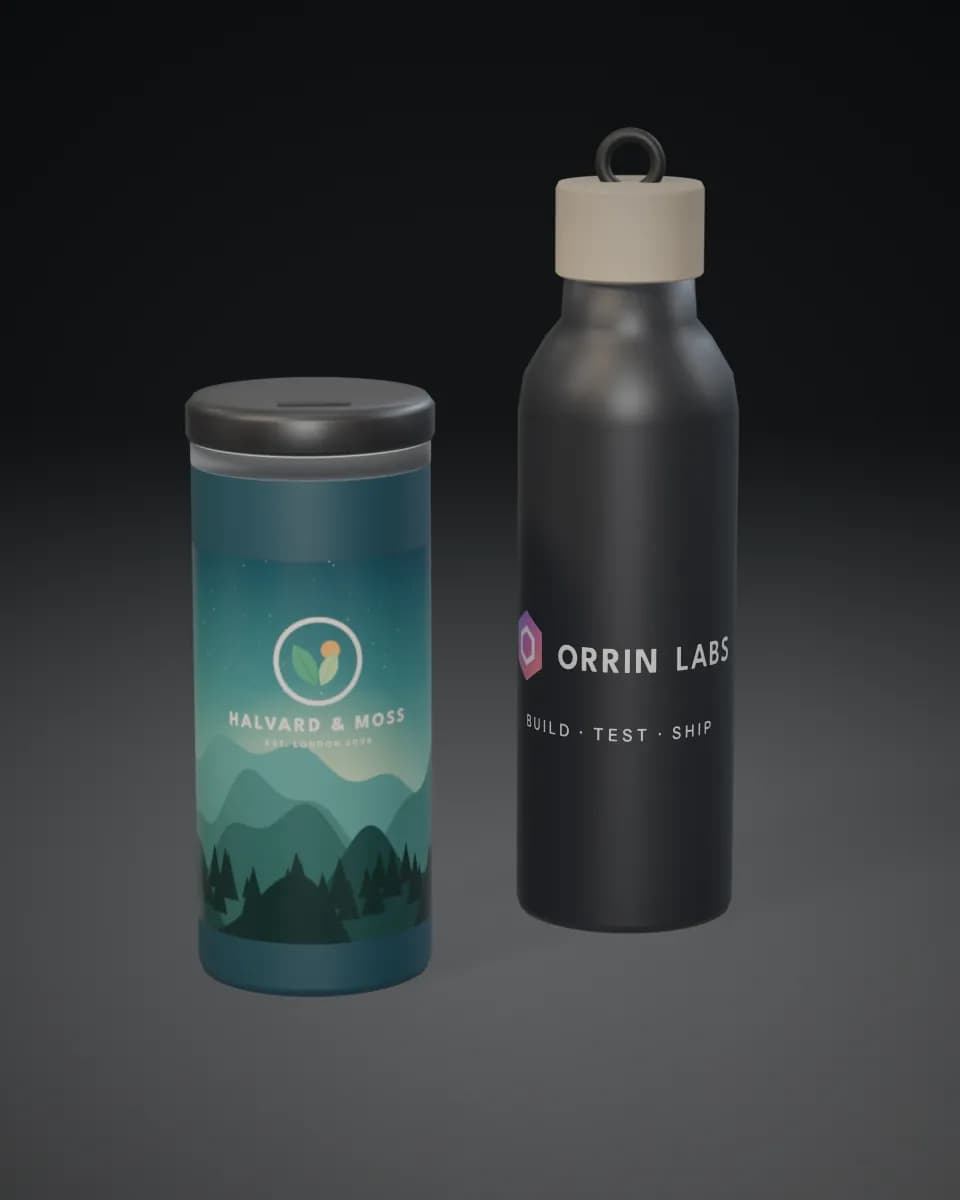 A teal tumbler wrapped in a printed landscape beside a black bottle printed with a colour logo