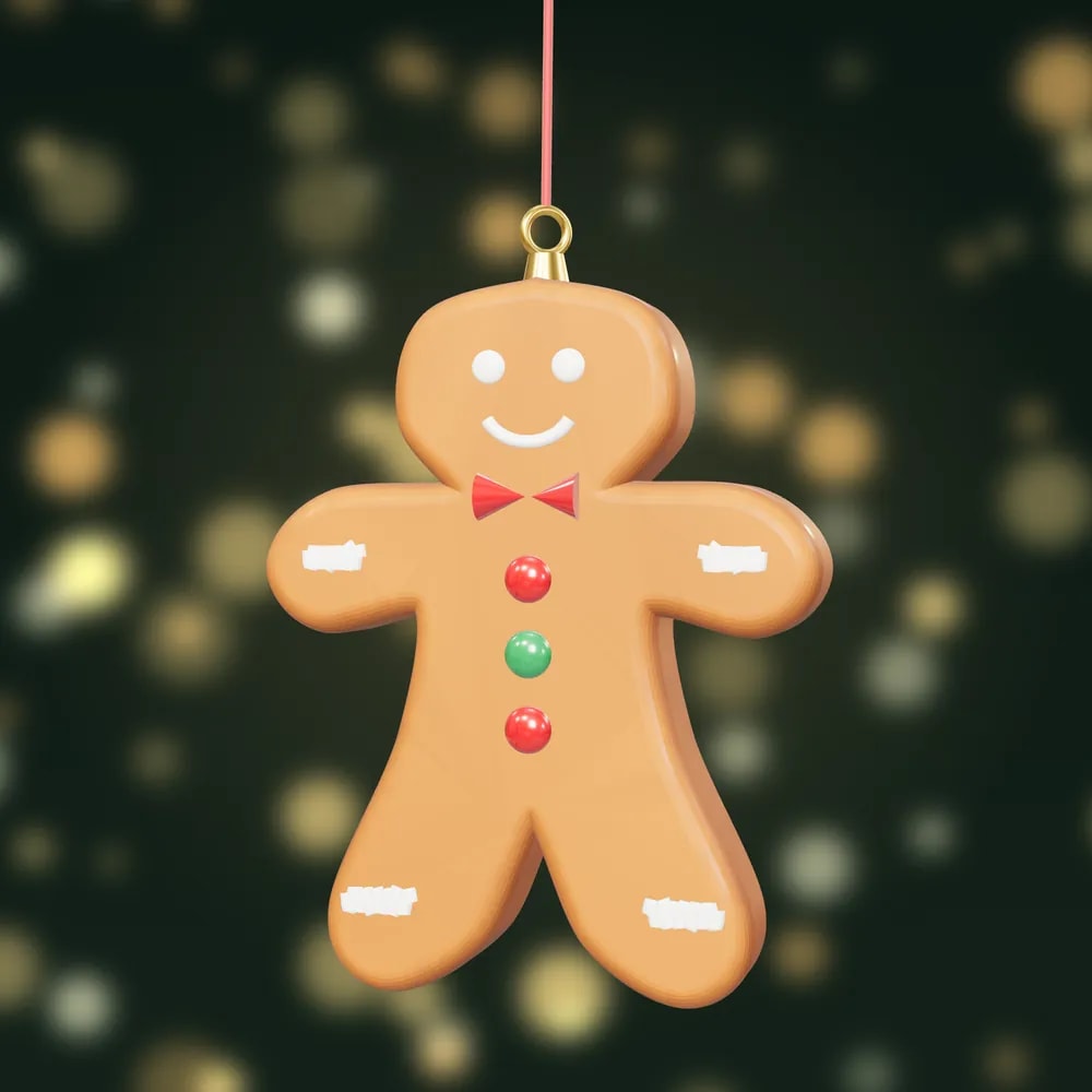A hand-painted gingerbread man bauble with white icing, a red bow tie and sweet buttons