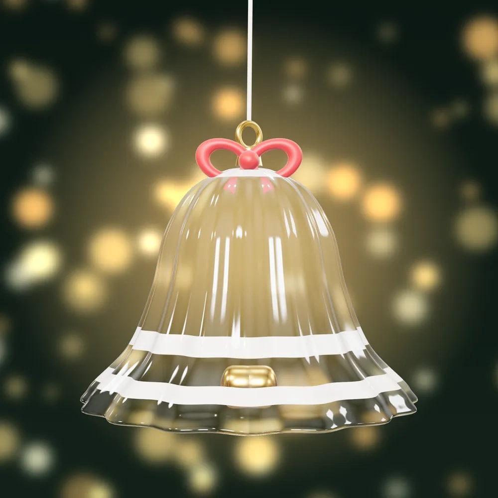 A clear, glass-like bell bauble with frosted bands, a gold clapper and a red velvet bow
