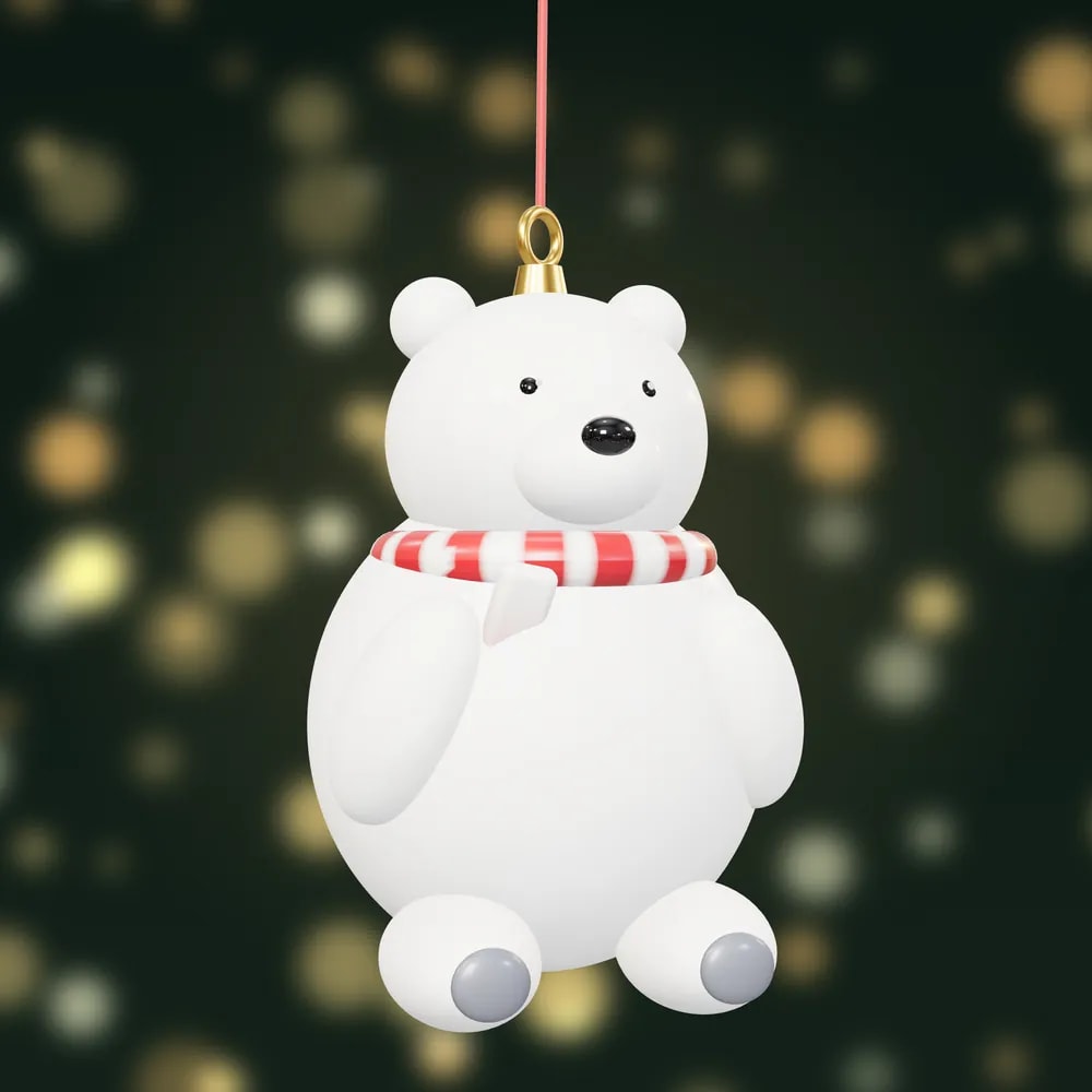 A hand-painted sitting polar bear bauble wearing a red and white striped scarf