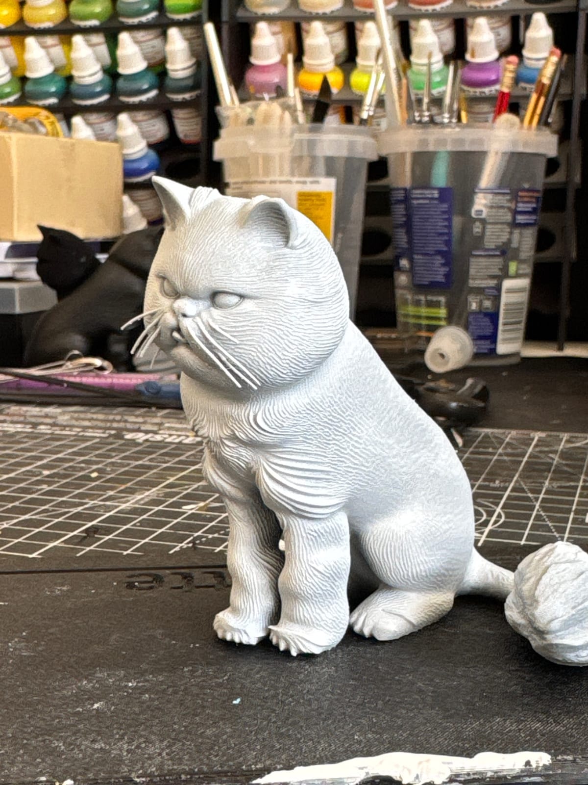 The same Persian cat figurine as an unpainted resin print