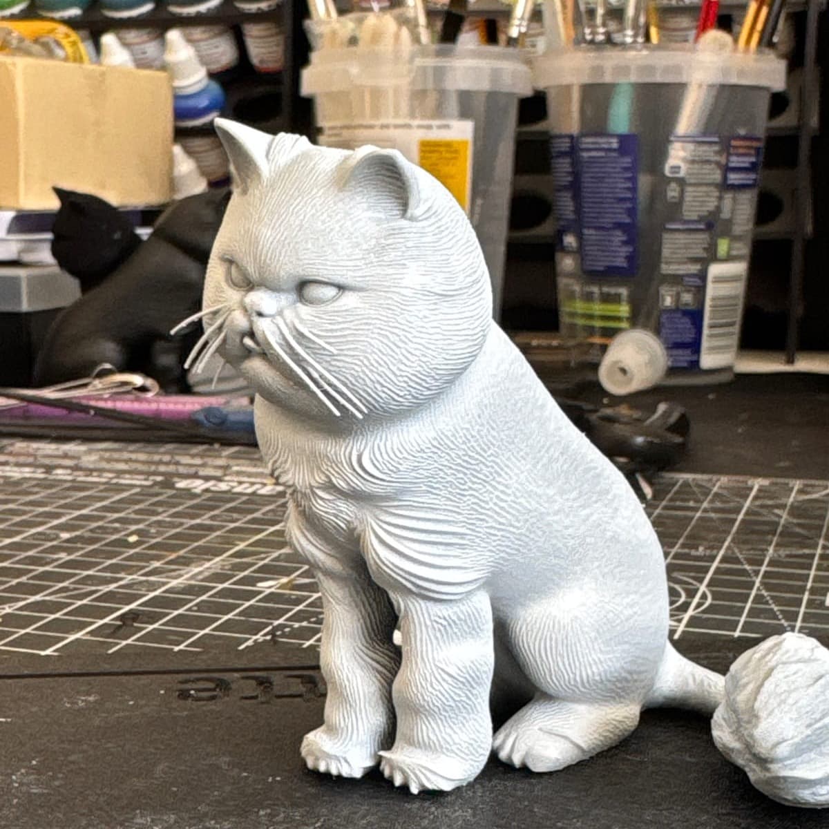 The same Persian cat figurine as an unpainted resin print