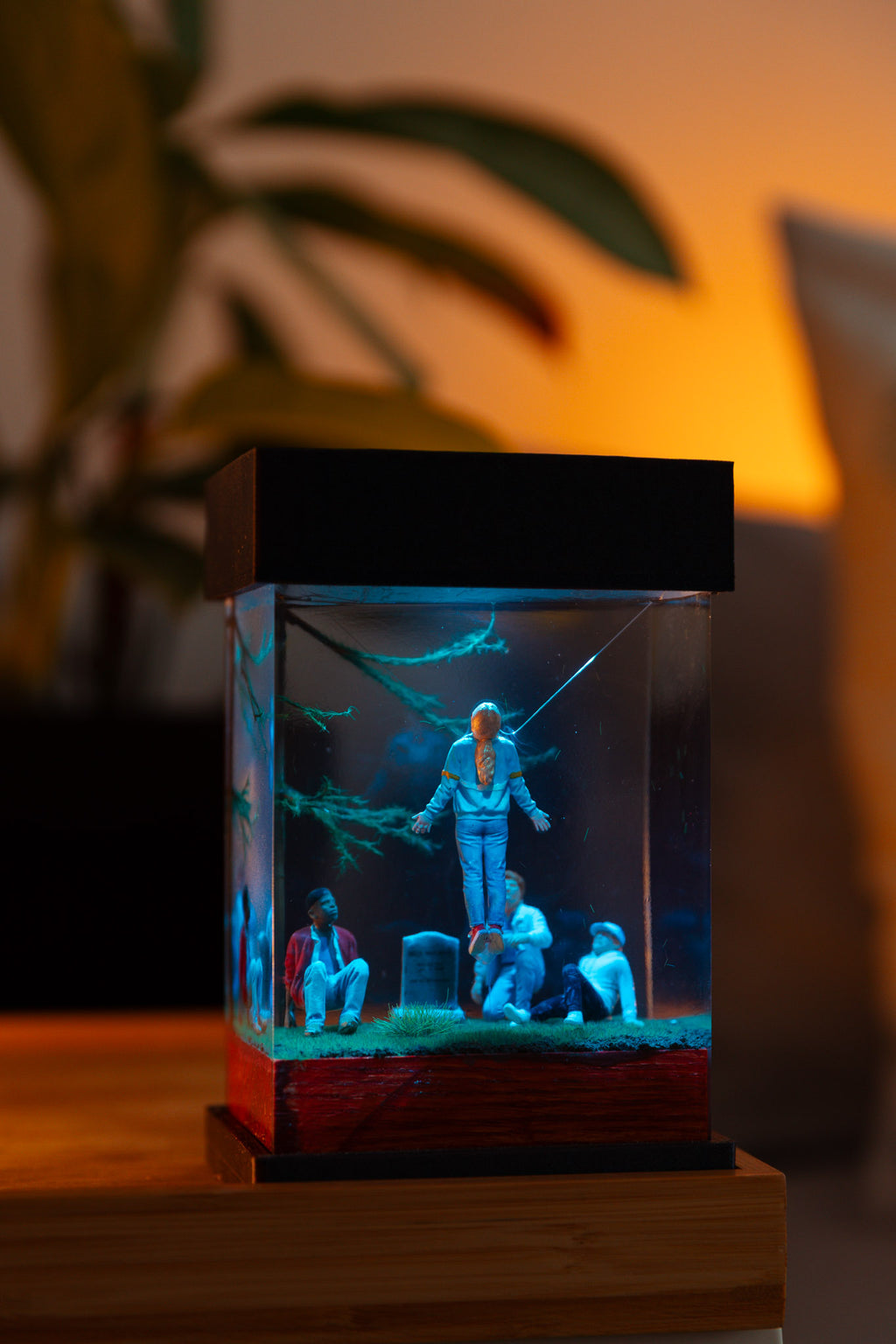 Miniature diorama Stranger things, Max Mayfield levitating, with people around a grave in a glass epoxy lamp on a dark background,  gift for stranger things fans