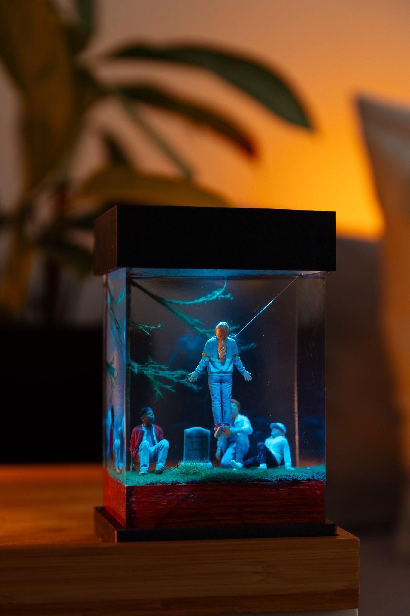 Miniature diorama Stranger things, Max Mayfield levitating, with people around a grave in a glass epoxy lamp on a dark background,  gift for stranger things fans